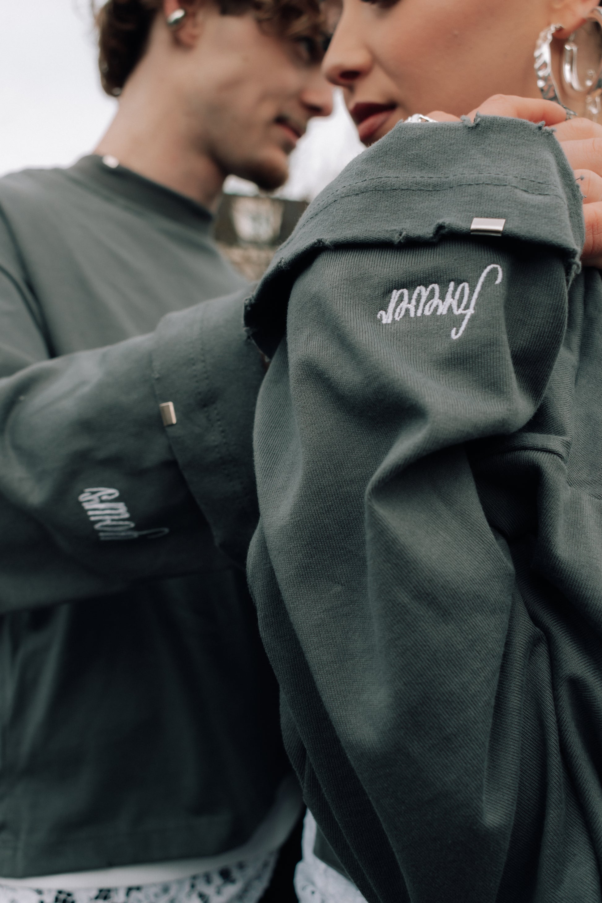 Models wearing sustainable Unisex long sleeve by anaïstudios