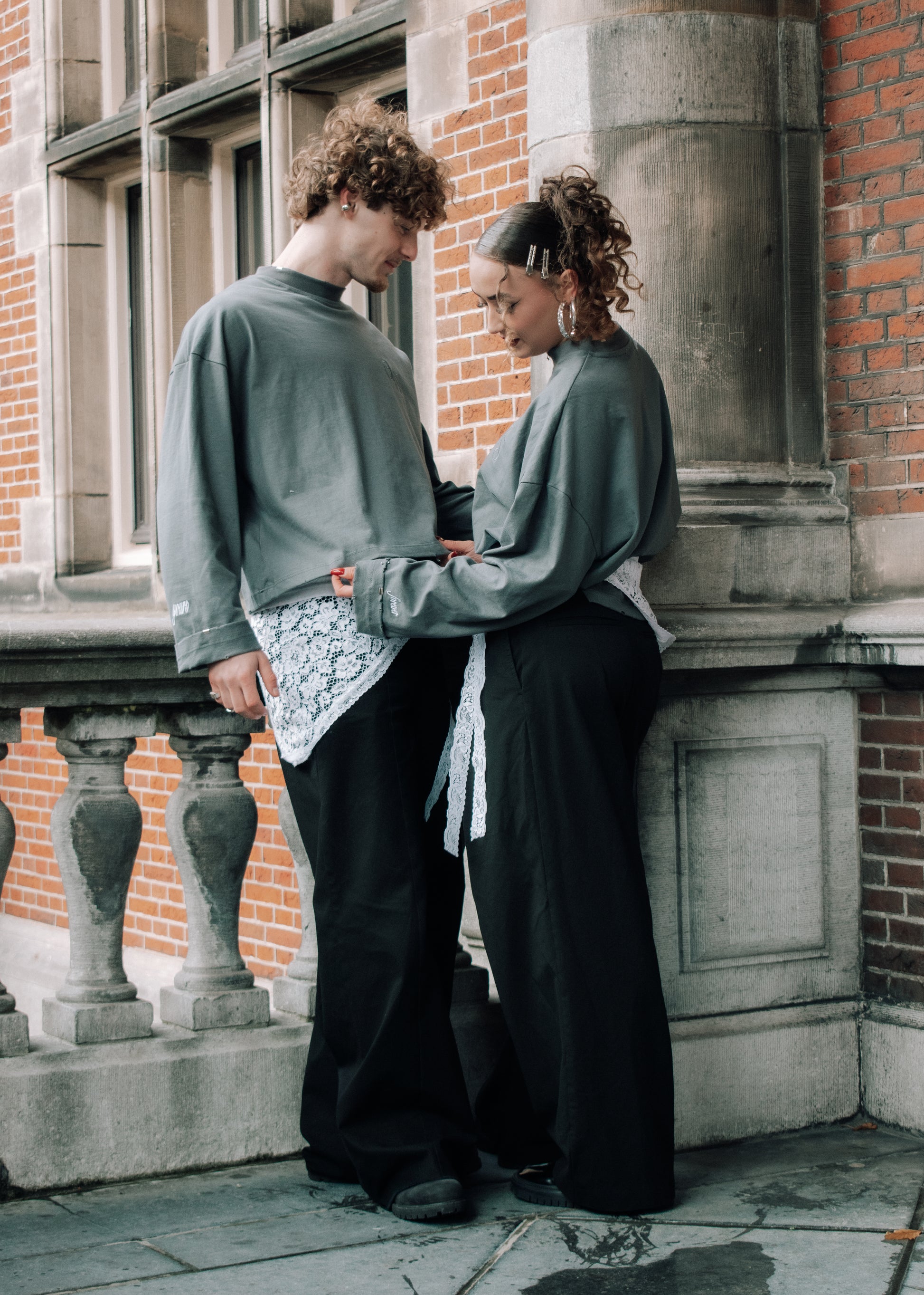 Models wearing sustainable Unisex long sleeve by anaïstudios