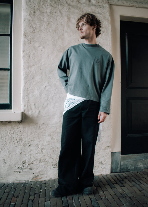 Model wearing sustainable Unisex long sleeve by anaïstudios